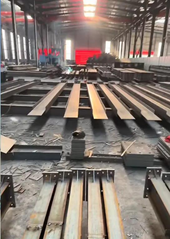 Steel structure fabrication workshop with H-beam assembly