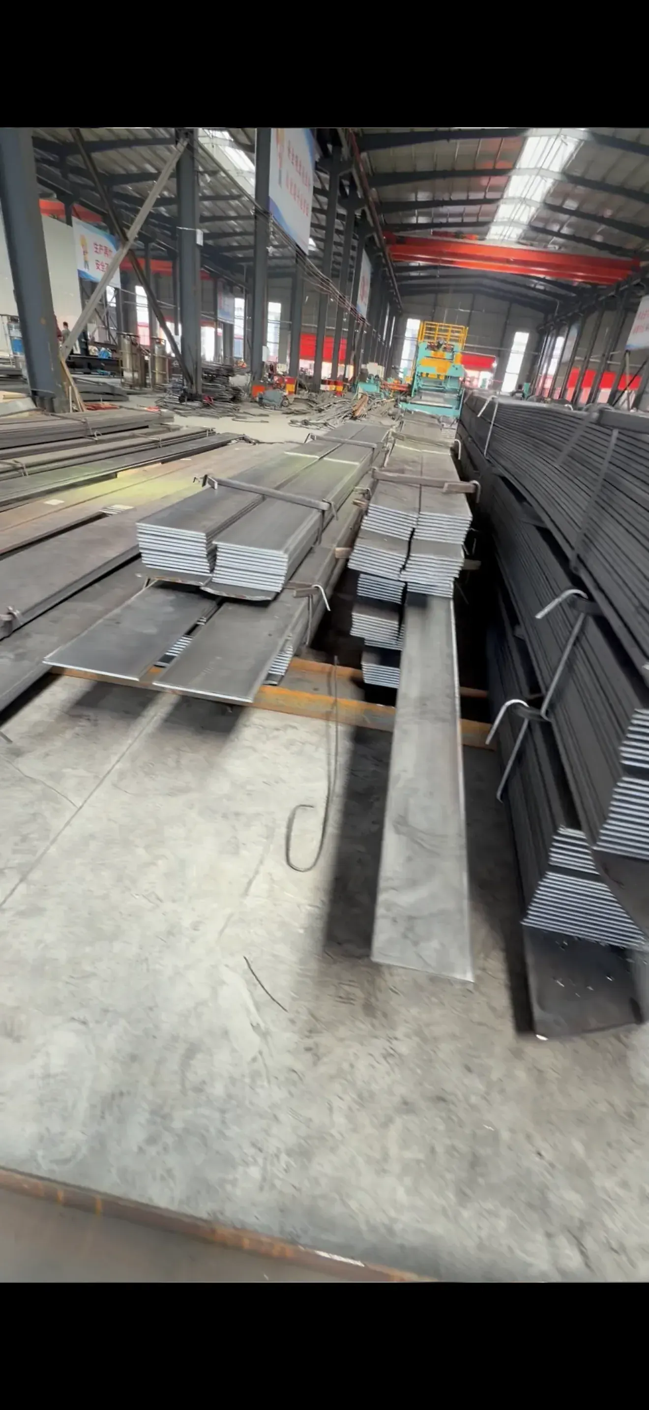 Steel plate and raw material storage area in factory
