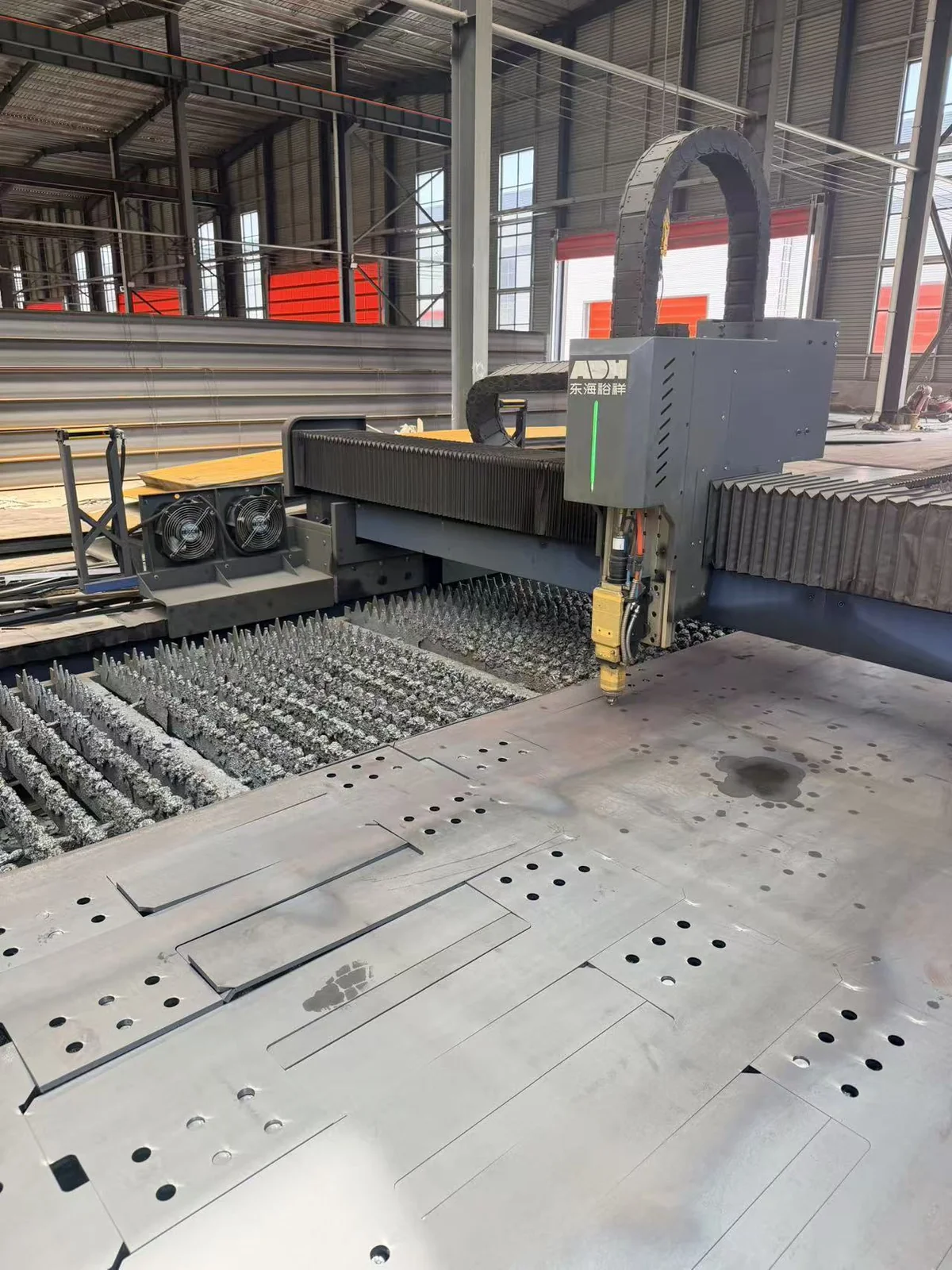 Step 2: CNC Cutting & Machining - Laotie Steel manufacturing process