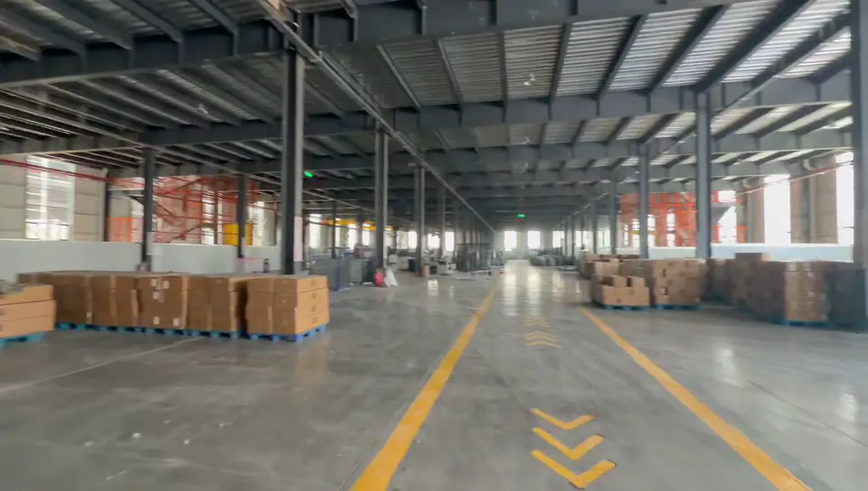 Hongxin Sports trampoline factory steel frame erection - portal frame columns and rafters during installation