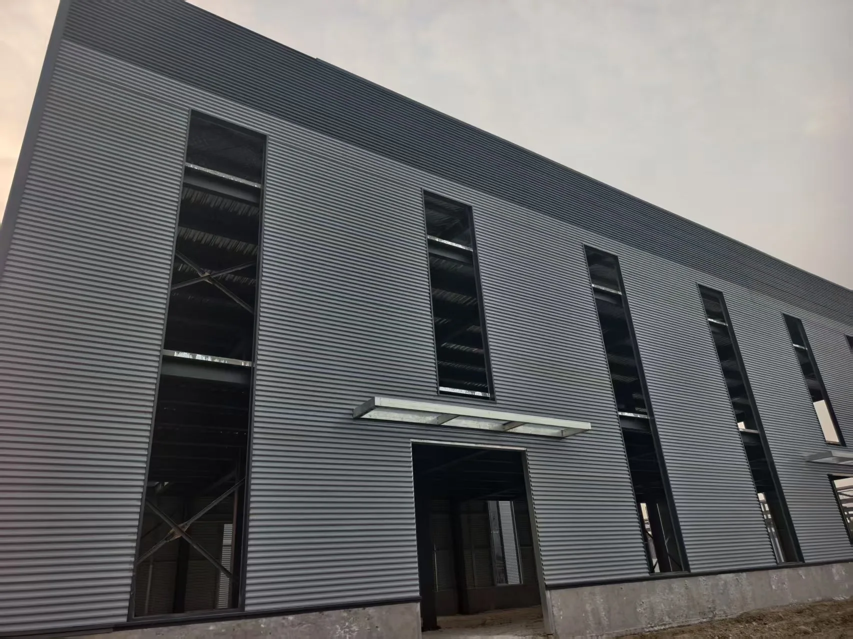 Sydney warehouse exterior view - cladding installation